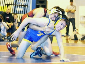 Jefferson senior Ivan Mukomol (top) battles with Tahoma's Jordan Higa in the 135-pound championship match Saturday at the SPSL North sub-regional tournament at Kent-Meridian High School. Higa won the match.