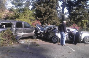 A vehicle apparently jumped the curb at a high rate of speed and smashed several parked cars off South 320th Street in Twin Lakes early morning May 10.