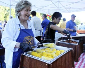 The 2013 Federal Way Kiwanis Salmon Bake is slated for July 26 at Steel Lake Park. Pictured: Former city councilmember and current State Rep. Linda Kochmar doles out corn on the cob.