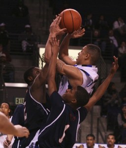Federal Way senior guard Isiah Umipig finished with a team-high 13 points during the Eagles' 67-47 win over Wilson Tuesday in the semifinals of the West Central District Tournament. Federal Way will play Lincoln at 8 p.m. at the ShoWare Center in Kent Friday for the district title.