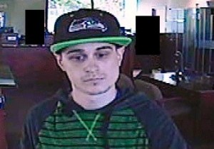 FBI officials believe this suspect pictured in video footage robbed the Federal Way Umpqua bank on Friday.