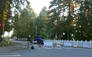 Federal Way police have closed off First Avenue South near the 32800 block after three men were shot in a drive-by shooting early Thursday. One of the suspects died and police are searching for the suspect.
