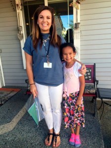 Second grade Nautilus K-8 teacher Alyssa Johnson poses with a student who the teacher visited at home.