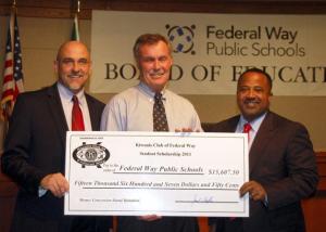 Jim Chaffee of the Federal Way Kiwanis Club presented a check for $15