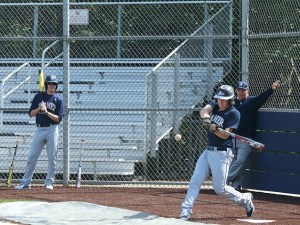 Todd Beamer co-captain Scotty Sunitsch swings his bat at the high school’s new baseball field. Snitsch is a pitcher that will be heading to Washington State University next year.
