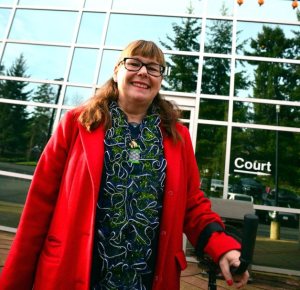 Federal Way City Councilwoman Susan Honda in front of City Hall during a recent Seahawks rally.
