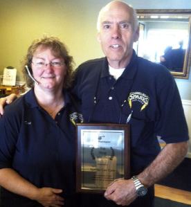 Pictured are Sparks owner Merle Pfeifer and service advisor Teri Smith.