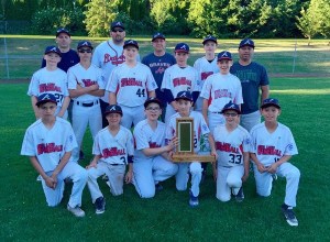 Steel Lake Little League Braves pose with trophy. Back row: Coach Steve Homfeldt