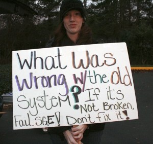 Elizabeth Bennett holds a sign for a protest march Dec. 13 involving the school district's controversial standards based grading system. Bennett is part of the recently formed Occupy Federal Way movement.