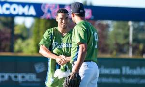 Thomas Jefferson graduate Lamar Neagle threw out the first pitch Thursday night at Cheney Stadium before the Tacoma Rainiers game. Neagle went on to score the game-winning goal for the Sounders Sunday in a 2-1 victory.