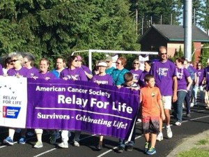 Cancer survivors kick off Federal Way's Relay for Life event with a lap around the track at Saghalie Middle School on June 6.