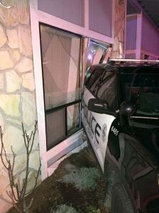 An unoccupied Federal Way police vehicle crashed into a home on Monday evening.