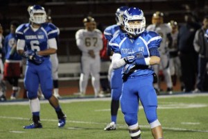 Federal Way’s Ben Koler looks to the sideline for the play call during the third quarter of Federal Way’s Nov. 7 win over Mariner at Federal Way Memorial Stadium.