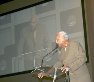 NBA Hall of Fame player and former Seattle SuperSonics coach Lenny Wilkens speaks about his family's financial hardships growing up during Reach Out's annual fundraiser at the Christian Faith Center on Tuesday morning.