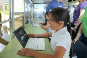 Wildwood Elementary students use the computers and choose from healthy food on Tuesday provided by FRED