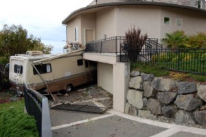 The occupants of the house were not at home and there were no witnesses to the crash. The driver had to disentangle himself from the wreckage and wander the neighborhood looking for help.