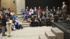 King County Councilman Pete von Reichbauer listens to a comment from Rashad Norris at the Oct. 7 forum at Thomas Jefferson High School. Federal Way Police Chief Brian Wilson