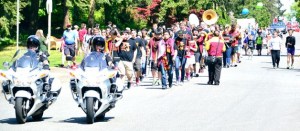 An annual parade highlighted the opening of the Marine Hills pool for the summer swim season on Saturday.
