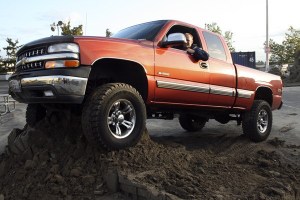 Jerry DeLay demolishes sand sculptures with his truck. Oct. 10