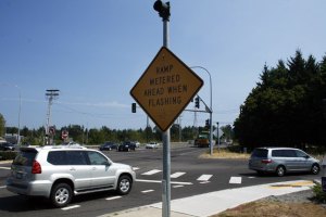 Vehicles enter southbound I-5 at South 320th Street in Federal Way. The on-ramp is metered to control traffic flow during rush hour.