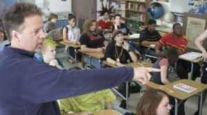 Steve Edmiston directs local students in “The Day My Parents Became Cool.”