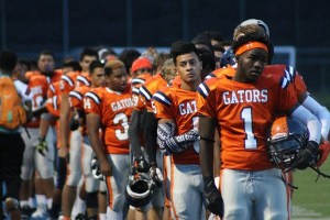 Decatur players await the national anthem before their game against Tahoma on Thursday