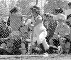 Jefferson senior centerfielder Sara Byrne slaps at a ball during Friday’s opening-round game against Tahoma at the West Central District at the Sprinker Recreation Center. The Raiders lost to Tahoma and Kentwood at the tournament.