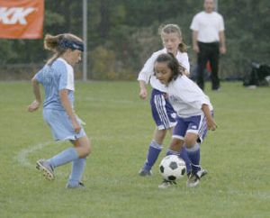 Members of the Federal Way United Reign ‘97 Silver Team (right) play Saturday at Saghalie Middle School in the annual Blast Off Tournament. The team finished in second place in their bracket.