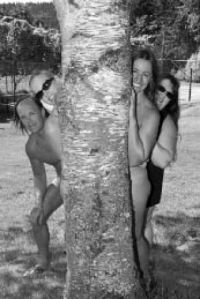 People pose at the Fraternity Snoqualmie nudist park in Issaquah.
