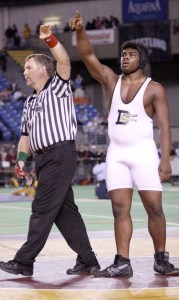 Decatur High School junior Tevyn Tillman reacts after winning the 285-pound state championship at Saturday's Mat Classic XX tournament inside the Tacoma Dome.