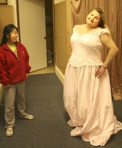 Heather Dunlap poses in her wedding gown at Julie's Fashion in Federal Way. Dionne Agostini