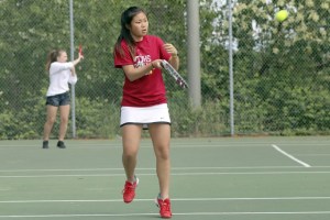 Michelle Kim returns a volley during a doubles match. She and Mia Rosa won their match 6-0