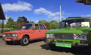 A pair of Soviet-era automobiles. Photo courtesy of the Soviet Car Museum