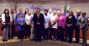 The Violence Prevention Coalition steering committee with the City Council and Mayor Jim Ferrell on Tuesday. Photo courtesy of Bruce Honda