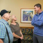 Dan Wilson takes time to visit with local patients