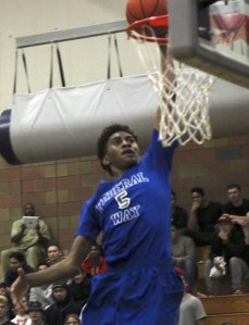 Jalen McDaniels dunks during the first half of Federal Way’s 72-65 win on Tuesday