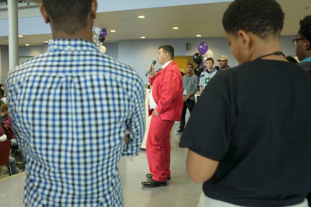 A student participant joined other peers on stage to talk about what a being a man means to him. Courtesy of An Vuong Nguyen