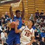 Federal Way senior Malcolm Cola throws down one of his four dunks during the Eagles&rsquo; 58-point win over the Thomas Jefferson Raiders. Photo courtesy Richard Balster