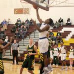 Eagles senior Malcolm Cola goes in for a layup in Saturday&rsquo;s playoff win over Kentridge. Cola led the team with 32 points and 16 rebounds. JEROD YOUNG, the Mirror