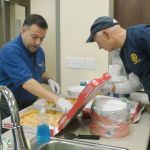 Rotary welcomes new neighbor with Super Bowl party