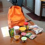 Easy-to-open food, such as mac &lsquo;n&rsquo; cheese, Cup o&rsquo; Noodle, snack packs, bread and tuna, are packed in the backpack for children to take home over the weekend. RAECHEL DAWSON, the Mirror