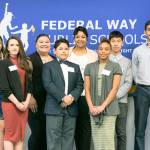 Federal Way Public Schools Superintendent Tammy Campbell stands with student advisers who greeted guests, emceed and ushered the Heroes Banquet, honoring people and organizations who help students, Saturday at Todd Beamer High School. Contributed Photo