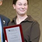 Lake Grove Elementary health and physical education specialist Dana Henry shows off her Let&rsquo;s Move Active Schools Outstanding Physical Activity Leader Award she received at the SHAPE America National Convention and Expo, March 16. Contributed photo                                Lake Grove Elementary health and physical education specialist Dana Henry shows off her Let&rsquo;s Move Active Schools Outstanding Physical Activity Leader Award she received at the SHAPE America National Convention and Expo, March 16. Contributed photo