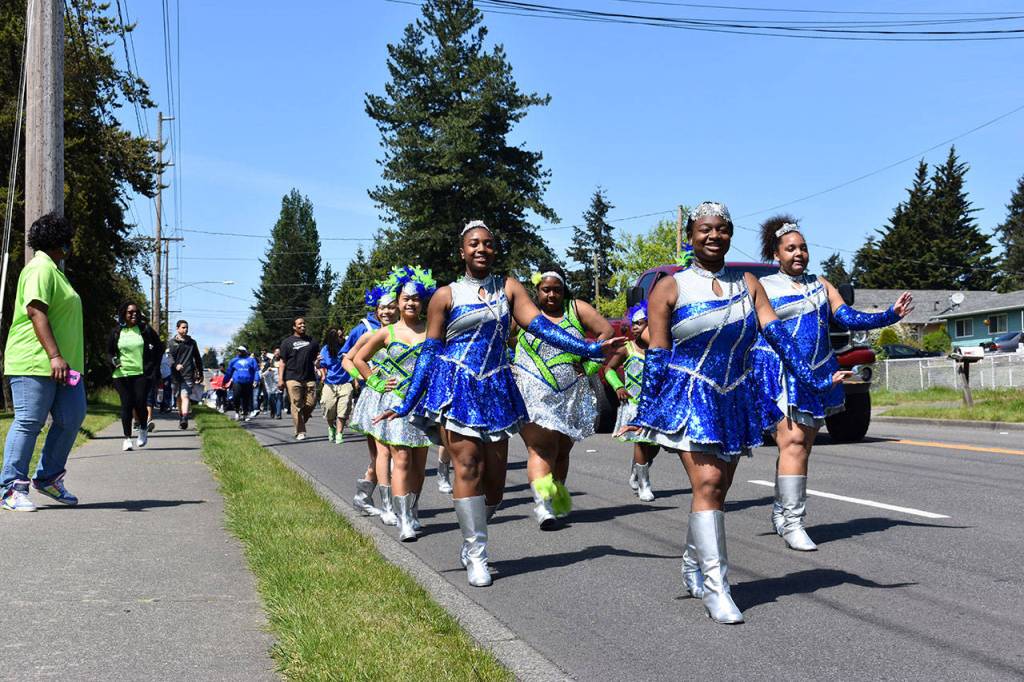 The Washington Diamonds Drill team led the march down South 288th Street. RAECHEL DAWSON, the Mirror