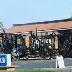 According to a South King Fire & Rescue press release, fire patterns and early photos and videos indicate the fire that destroyed nine businesses at a Federal Way shopping complex on 320th Street Sunday morning started at the north end. The cause, however, remains under investigation. Courtesy Shelley Pauls