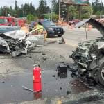 Pacific Highway South between South 340th and South 344th was closed following a two-car collision that sent two people to Harborview Medical Center in Seattle with life-threatening injuries and a third to a local hospital with minor injuries. Police believe the driver of the first vehicle, which struck a vehicle head on, was impaired and distracted, according to a police spokesperson. Photo courtesy South King Fire & Rescue                                Pacific Highway South, between South 340th and South 344th, was closed following a two-car collision that sent two people to Harborview Medical Center in Seattle with life-threatening injuries , Monday. Police believe the driver of the first vehicle, which struck a second head on, was impaired and distracted, according to a police spokesperson. Photo courtesy South King County Fire & Rescue