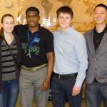 Amna Hadzihasanovic (left), Ederly Beausilien, Dmitriy Koval and Boo Park are four of the nearly 20 Computer Information Systems students who are designing the corporate computer network that will be used during the International Collegiate Cyber Defense Invitational, June 20–22, 2017. Organized and hosted by Highline College, the invitational will bring together students from higher education institutions around the world. Courtesy of Highline College