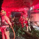 Firefighters battle fire at abandoned house on Military Road