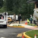 Puget Sound Energy works to shut off the gas. Courtesy of South King Fire and Rescue