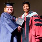 An Internet Academy graduate poses for a photo with Federal Way Public Schools Superintendent Tammy Campbell during the class of 2017 graduation ceremony Saturday at the Tacoma Dome. Photo Courtesy Federal Way Public Schools